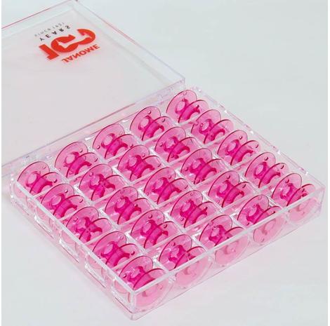 25 sztuk różowych szpulek Janome w pudełku