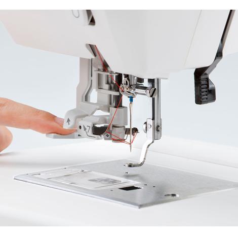 Nawlekacz igły z hafciarki Janome MC100E