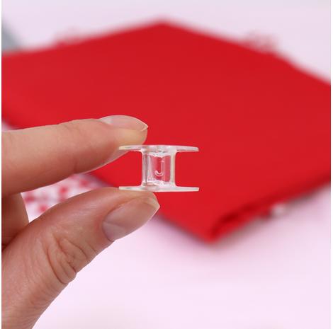 Oryginalne szpulki do maszyn marki Janome - oznaczenie J